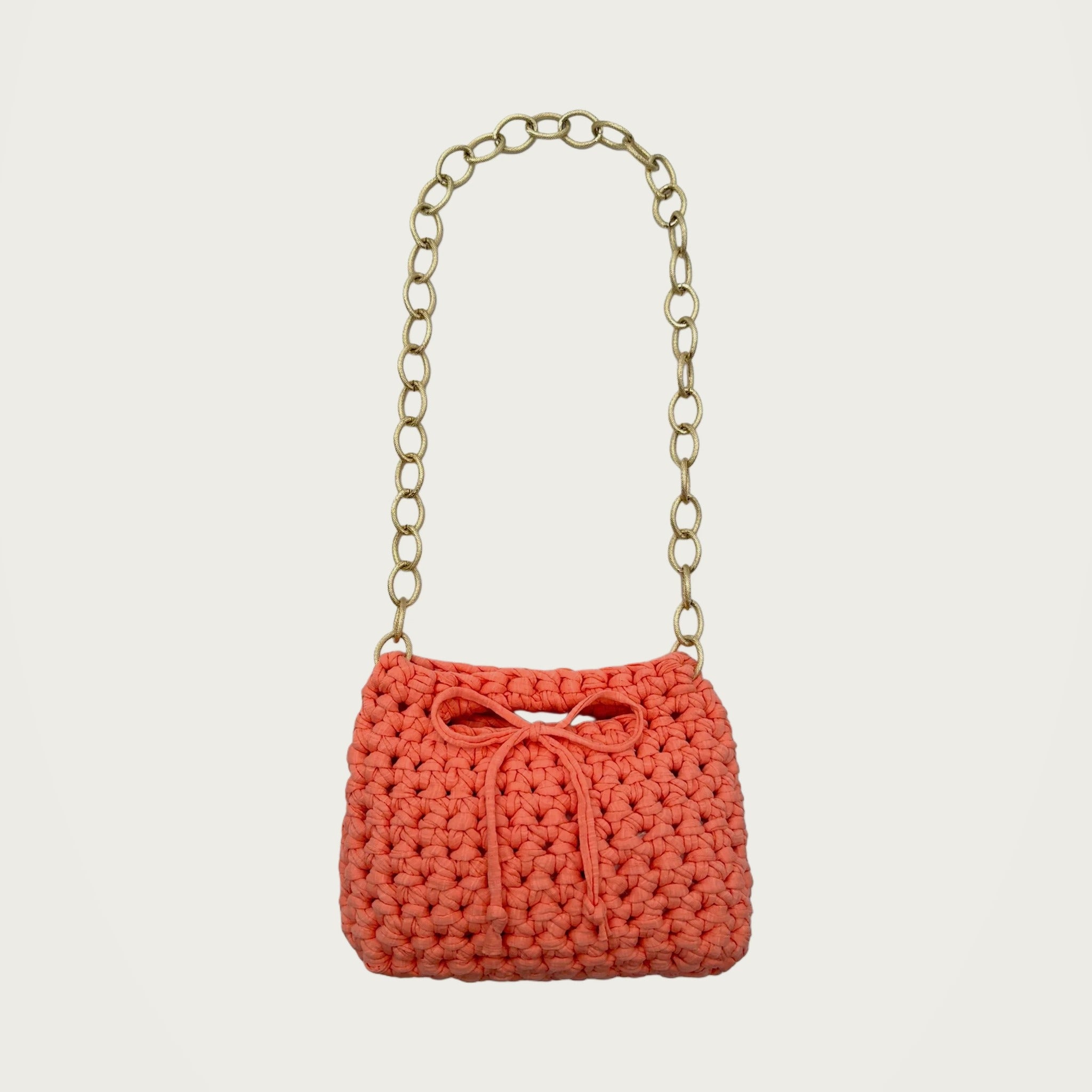 Crochet Handbag - Peach on an ivory studio ground
