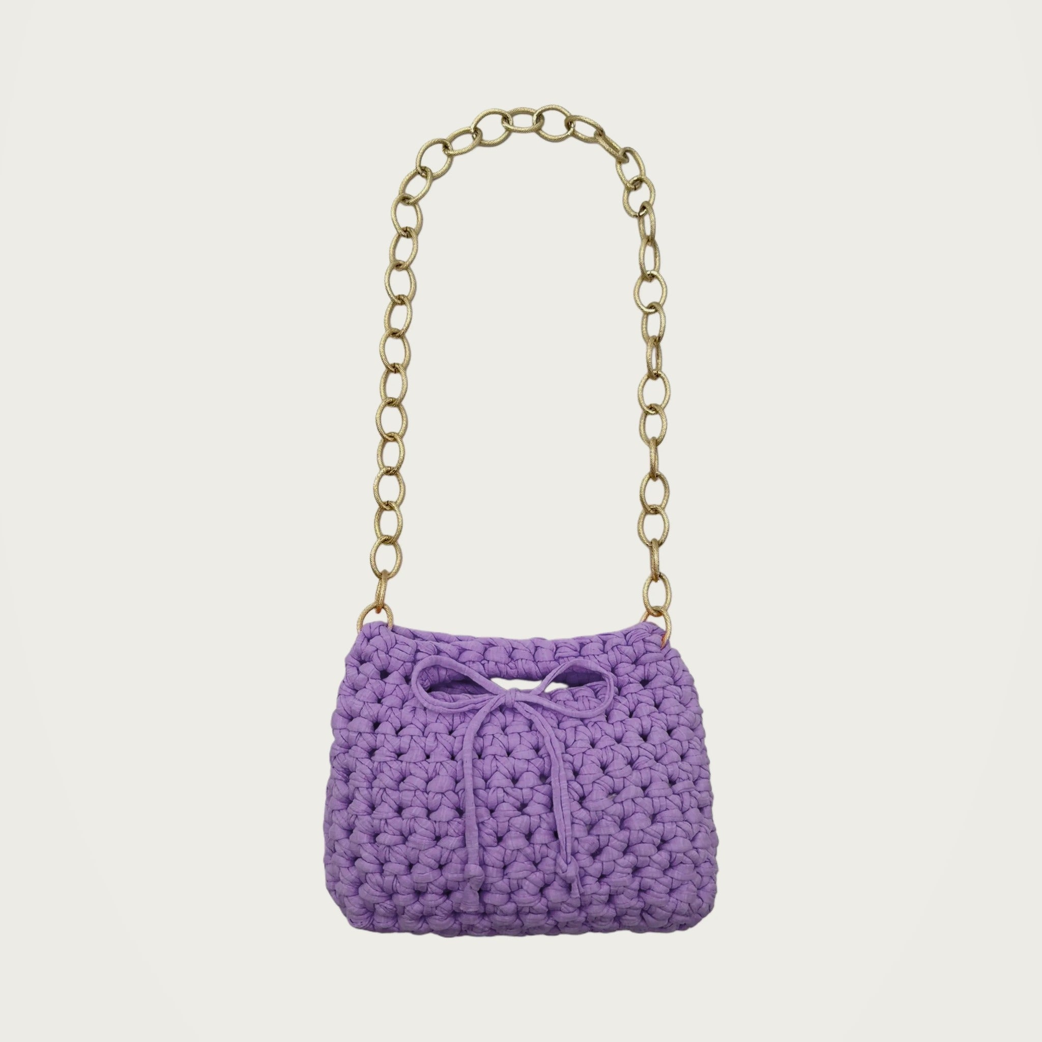 Crochet Handbag - Purple on an ivory studio ground