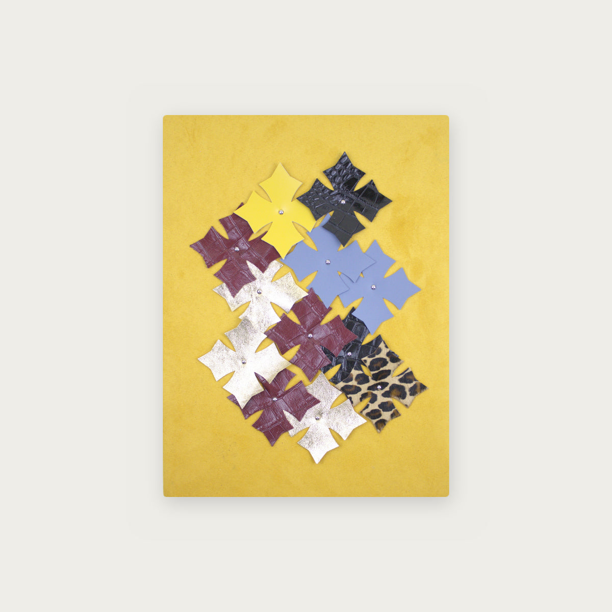 Wall Art No. 87, Ochre I – leather crosses on ochre microfiber, 40 × 30 cm
