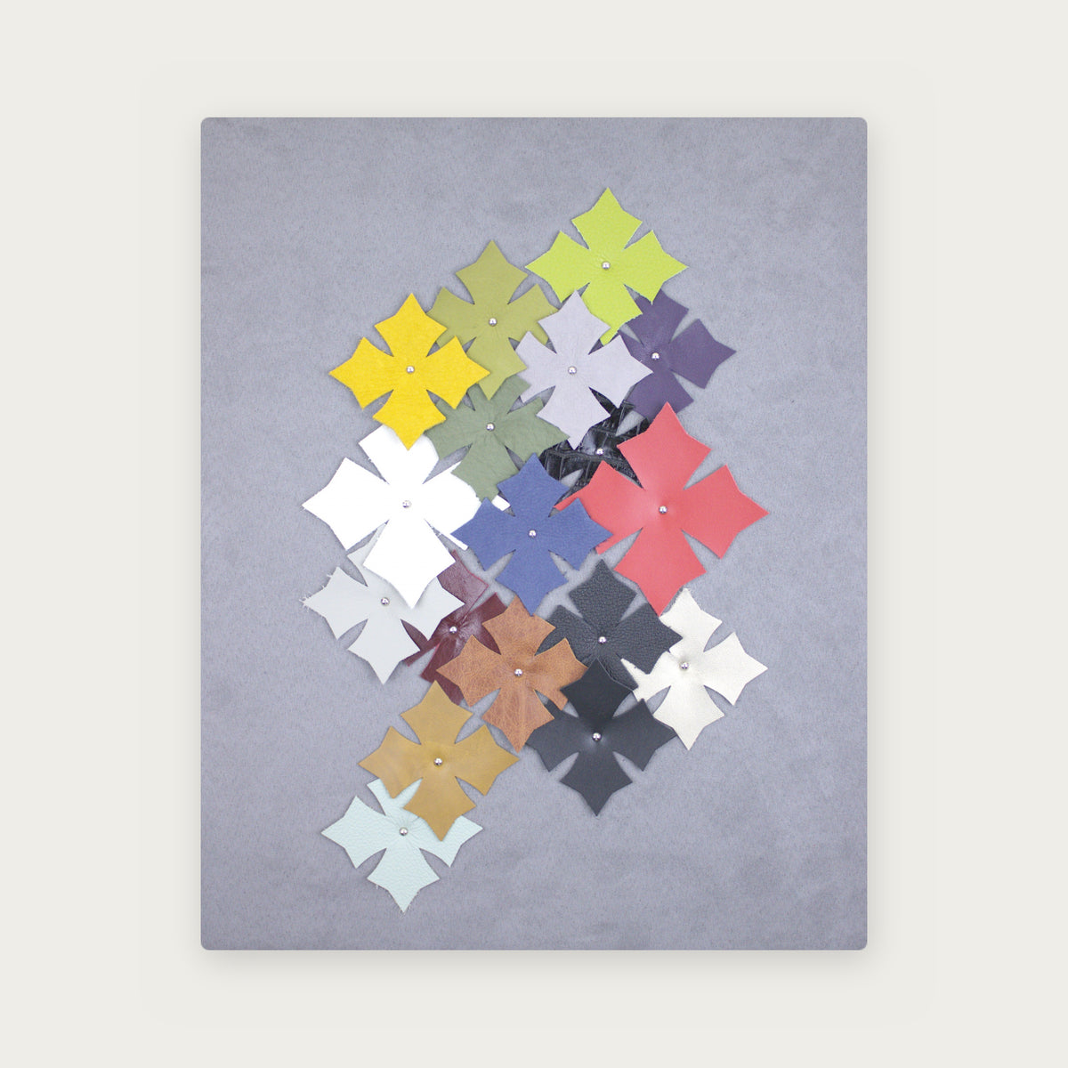 Wall Art No. 52, Grey – leather crosses on grey microfiber, 50 × 40 cm