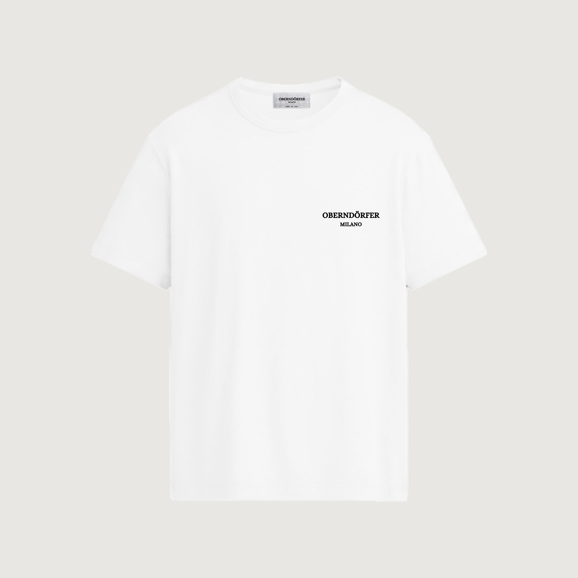 The Constellation T-Shirt in white, front, small lockup at the chest