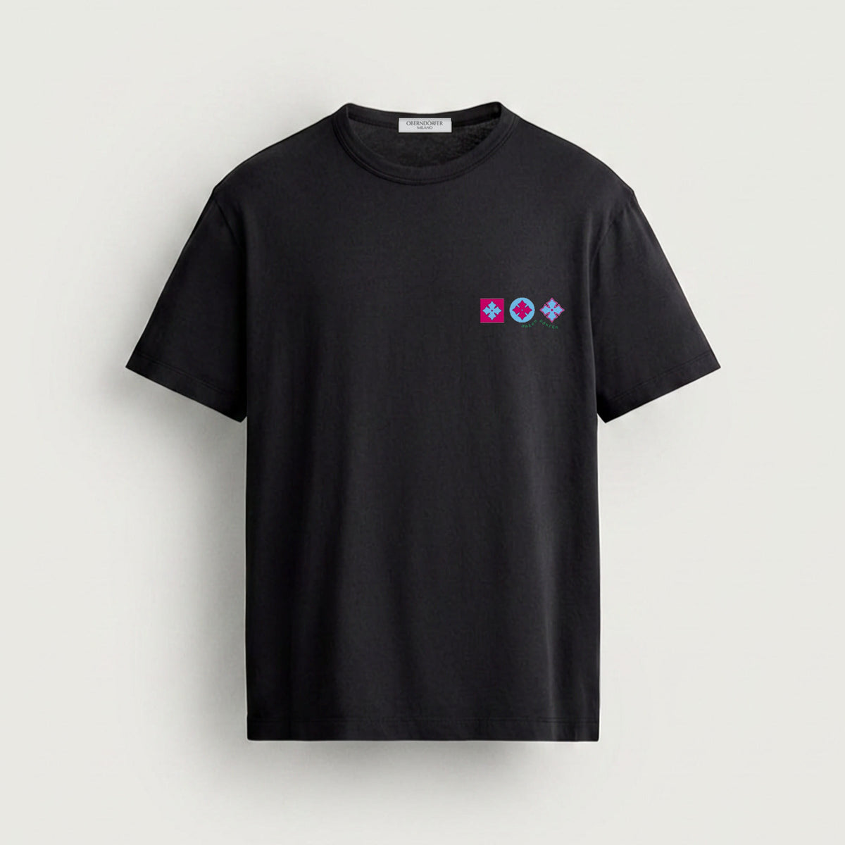 T-Shirt with Logo Magenta in black, front, three emblems at the chest