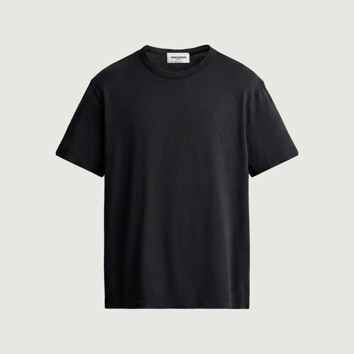 The Initials T-Shirt in black, front, left plain