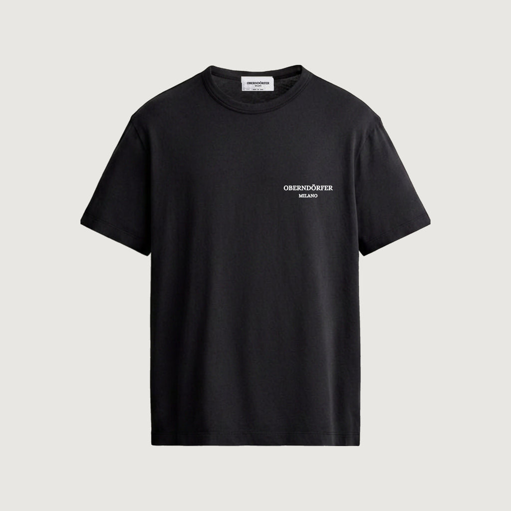 The Lattice T-Shirt in black, front, small lockup at the chest