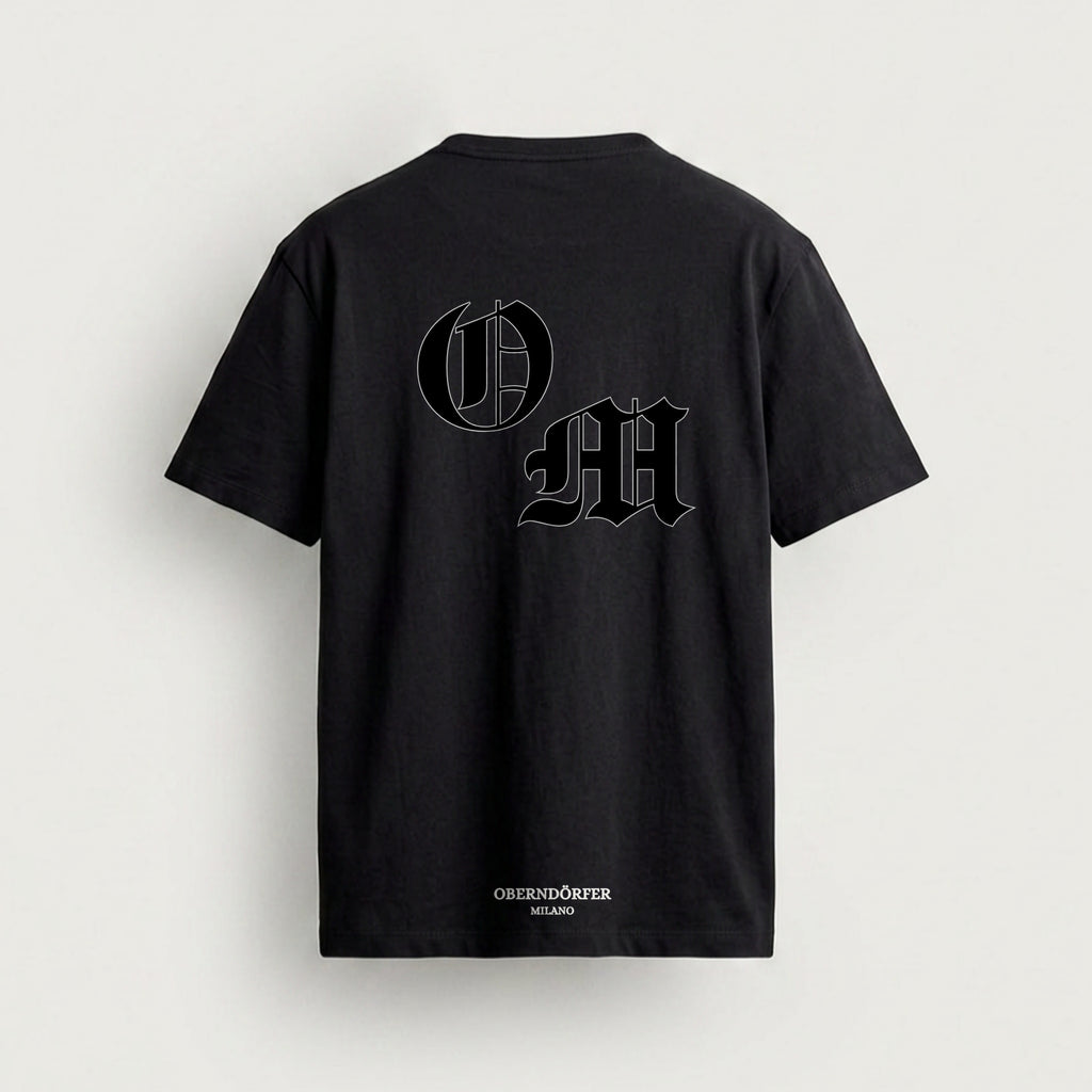 T-Shirt OM in black, back, interlocking O and M in blackletter