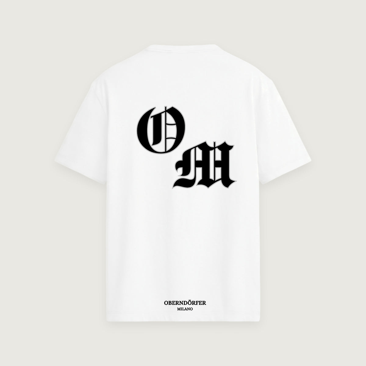 T-Shirt OM in white, back, interlocking O and M in black blackletter