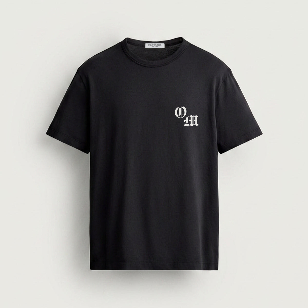 T-Shirt Star patch in black, front, OM monogram at the chest