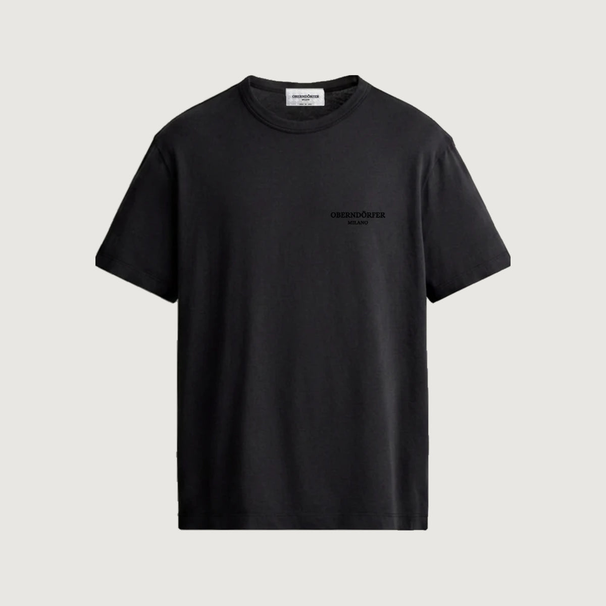 The Tonal Wordmark T-Shirt in black, front, Oberndörfer Milano embroidered at the chest in matching black thread