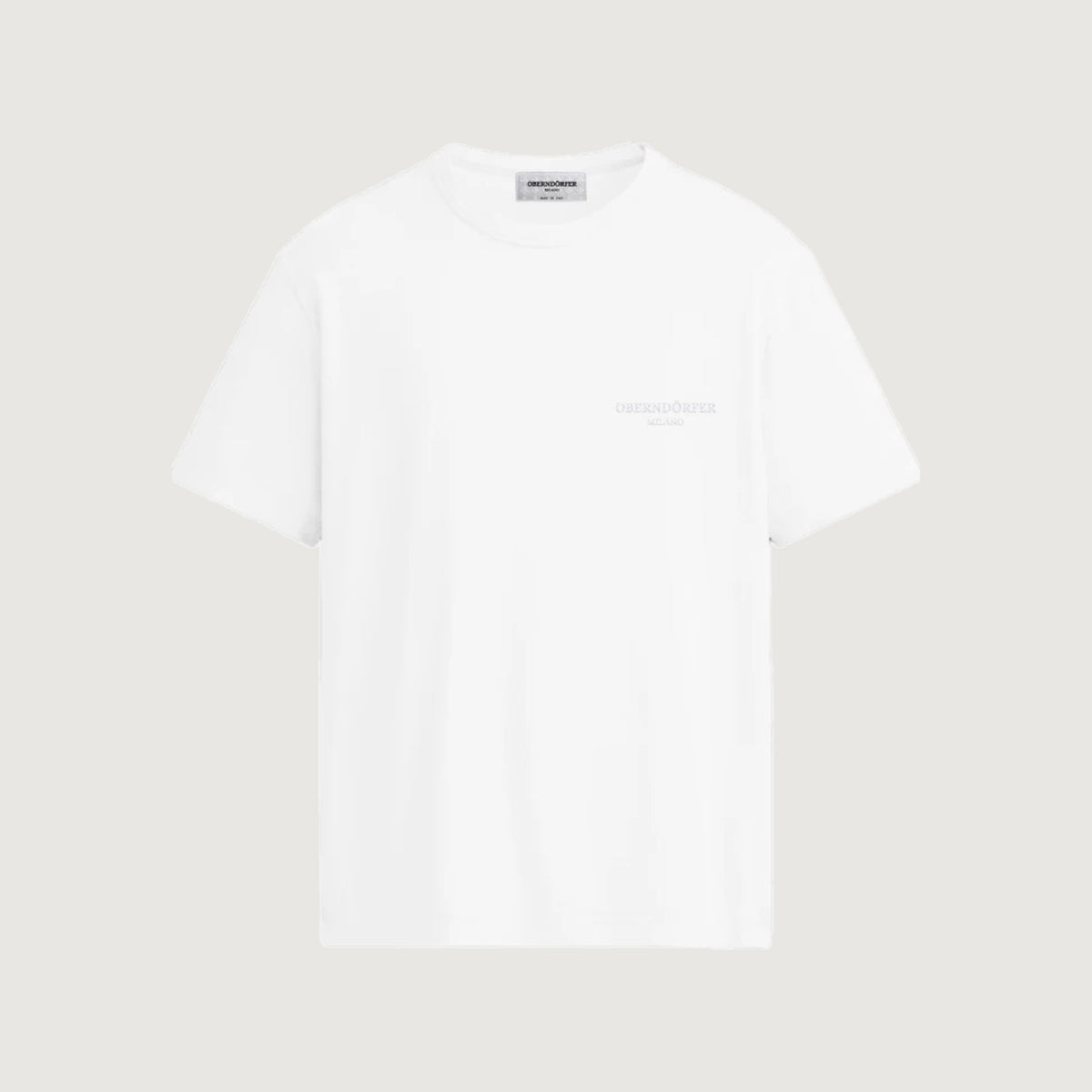 The Tonal Wordmark T-Shirt in white, front, Oberndörfer Milano embroidered at the chest in matching white thread